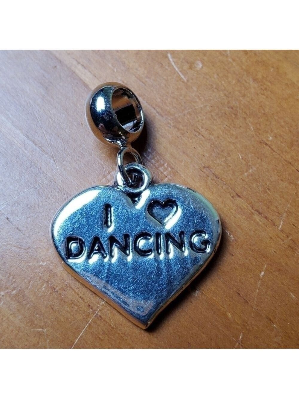 NWOT charm, silver colored heart, 'I Love Dancing'